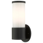 Livex Lighting - Textured Black Contemporary, Urban, Minimalistic, Clean Outdoor Wall Lantern - Add a dash of character and radiance to the exterior of your home with this wall lantern. This single-light mini fixture from the Landsdale Collection features a satin opal white glass cylinder closed top shade, set off with a textured black finish. The clean lines of the back plate complement the cylindrical glass shade adorned with detailed trim at the end creating a minimal, sleek look that works well in most outdoor or indoor settings. This fixture adds charm and contemporary aesthetics to your home.