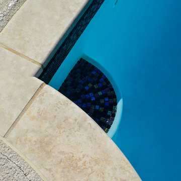 Grecian swimming pool with L, diving board and hot tub