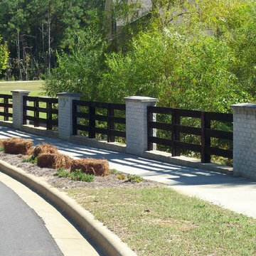 Creosote 3 rail fence with brick columns