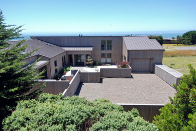 Example of a beach style home design design in San Francisco