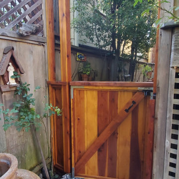Stained Grooved Redwood Fence and Gate