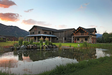 Inspiration for a rustic multicolored mixed siding exterior home remodel in Other