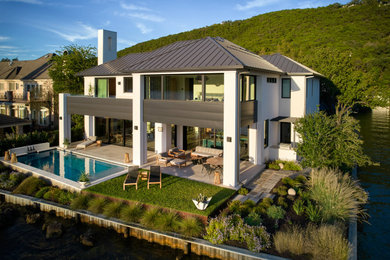 This is an example of a modern two-storey white house exterior in Austin.