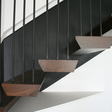 Custom Cantilever Staircase w/ Custom Design Railing & Curtain Wall