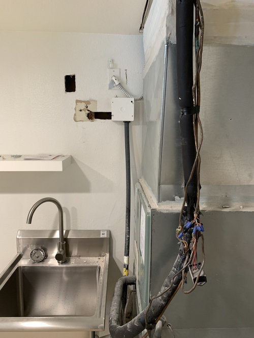 How can I hide this unseemly HVAC unit in my laundry room?