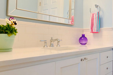 Inspiration for a mid-sized eclectic kids' white tile and ceramic tile bathroom remodel in Austin with shaker cabinets, white cabinets, blue walls and quartz countertops