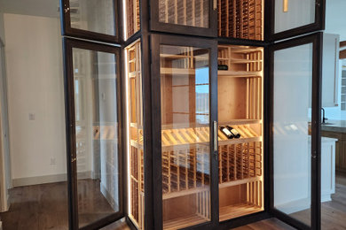 Wine cellar - craftsman wine cellar idea in Denver