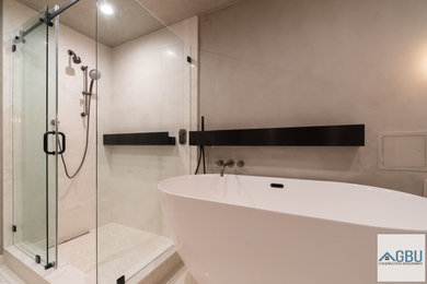 Bathroom - mid-sized modern master beige tile and ceramic tile ceramic tile, beige floor and single-sink bathroom idea in San Francisco with flat-panel cabinets, white cabinets, a one-piece toilet, brown walls, an undermount sink, quartz countertops, white countertops and a floating vanity