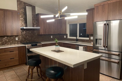 Example of a mid-century modern kitchen design in Salt Lake City