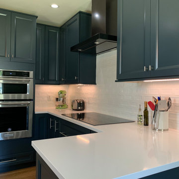 White Tailored Subway Tile, Peninsula Seating, White Quartz Counters - Stunning!