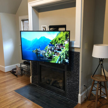 Framed TV Above Fireplace