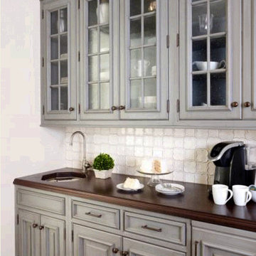 Natural Stone Wave Mosaic Backsplash in Stunning Contemporary Kitchen