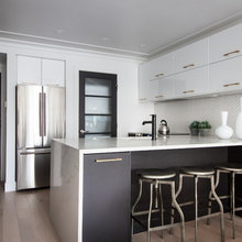 black cabinet with white waterfall edge