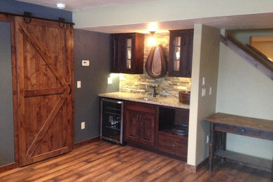 Example of a mountain style basement design in Other