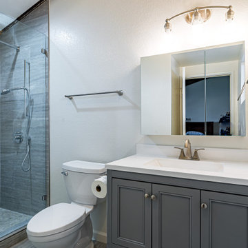 Shower Tile & Enclosure; Vanity, Mirror & Lighting; Toilet Installation