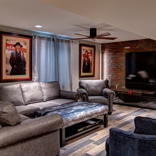 Inspiration for a medium sized industrial look-out basement in Other with grey walls and multi-coloured floors.