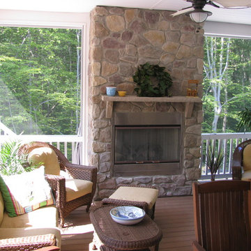 Screen Porch With Stone Fireplace