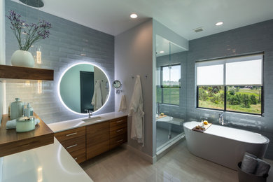 Large minimalist master blue tile and ceramic tile single-sink bathroom photo in Denver with flat-panel cabinets, an undermount sink, quartz countertops, white countertops and a floating vanity