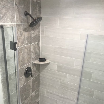 Marble and Whitewash Wood Plank Tile Shower with Oil Rubbed Bronze Shower Fixtur