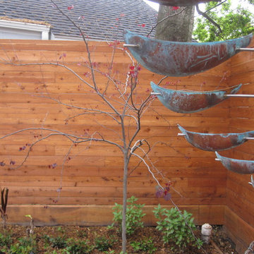 A wrap around garden with a fabulous water featurel!