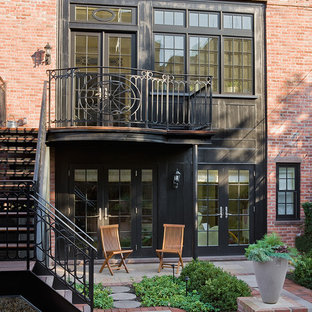 Создайте стильный интерьер: фасад таунхауса в викторианском стиле с облицовкой из кирпича - последний тренд