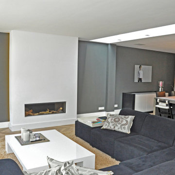 Rénovation et transformation complète de maison avec cheminée et puits de lumièr