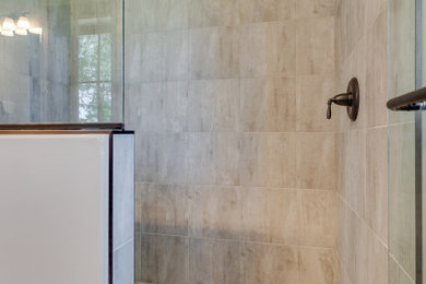 Inspiration for a large modern alcove shower remodel in Seattle