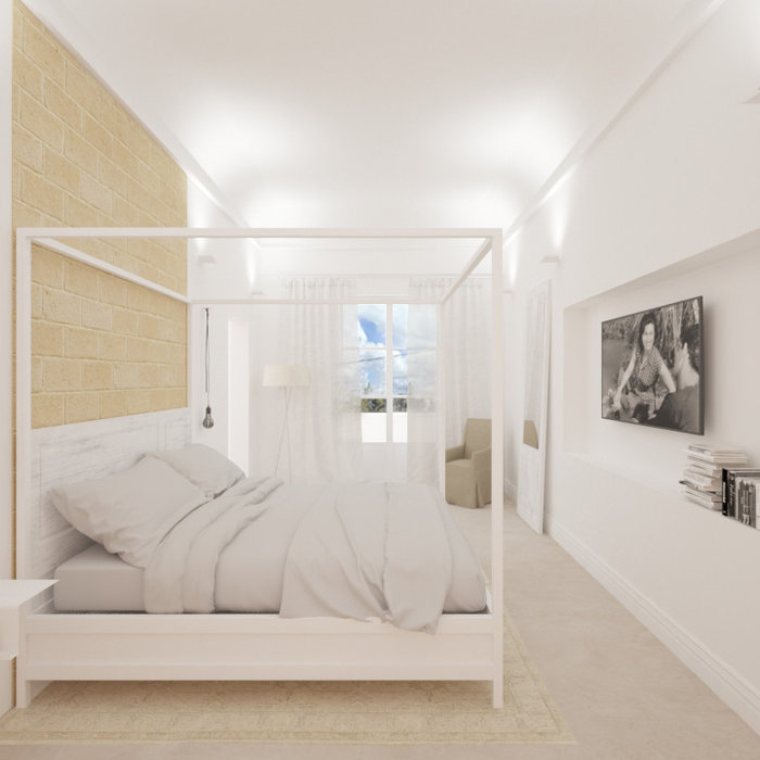 Bedroom - mid-sized mediterranean master concrete floor and gray floor bedroom idea in Catania-Palermo with white walls
