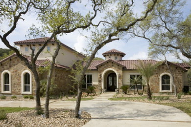 This is an example of a mediterranean exterior in Houston.