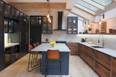 Medium sized contemporary kitchen in London.