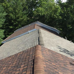 Old 3-Tab Shingle Removal on Entire Apartment Complex - Roofing And Gutters