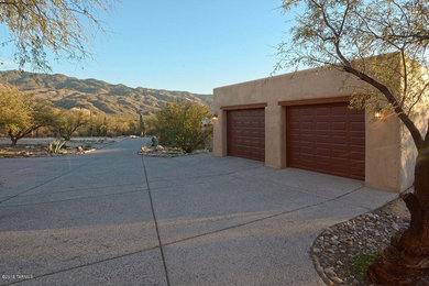 Carport - mid-sized southwestern attached two-car carport idea in Phoenix