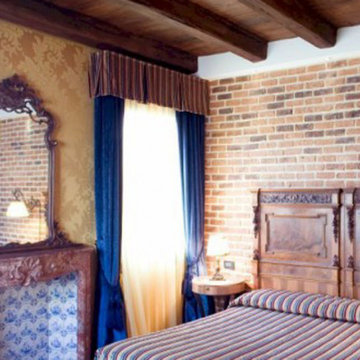 Bedroom with brick tiles