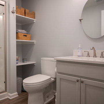 Finished Basement with Seated Bar, Gym and Bathroom in White Lake, MI