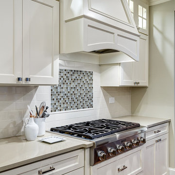 Custom hood detail blends with cabinetry