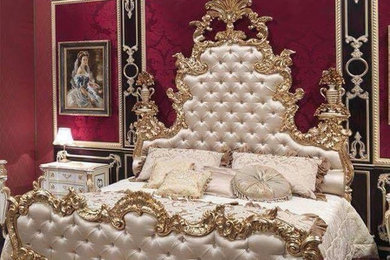 Large elegant master bedroom photo in Amsterdam