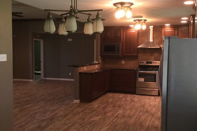 Example of a transitional home design design in Austin
