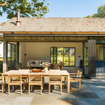 Barn-Inspired ADU & Guest Cottage in NY with NanaWall Steel Effect Doors