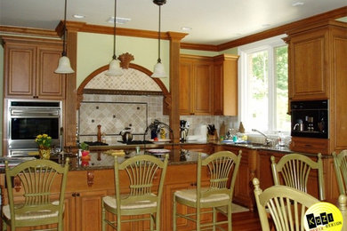 Design ideas for a mid-sized traditional l-shaped kitchen in Other with with island.