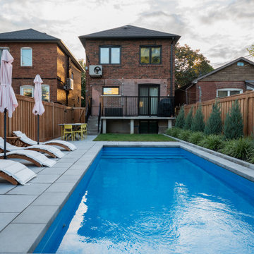 Narrow-Lot Backyard Pool with Paver Deck, Cedar Privacy Fence & Layered Planting