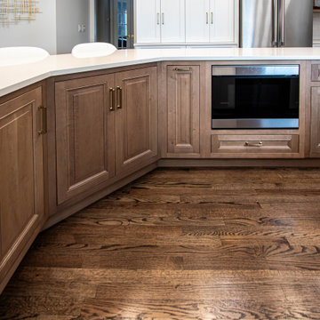 Two Tone Kitchen with Floating Shelves and Island Seating and Updated Fireplace