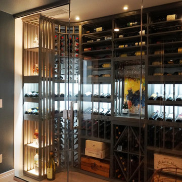 Transitional Wine Cellar with Wooden Wine Racking and Glass Door