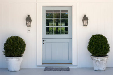 Inspiration for a transitional dutch front door remodel in New York