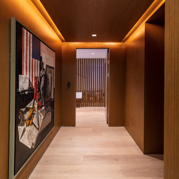 Modern Wood-Clad Hallway | Sculptural Lighting and Artful Flow
