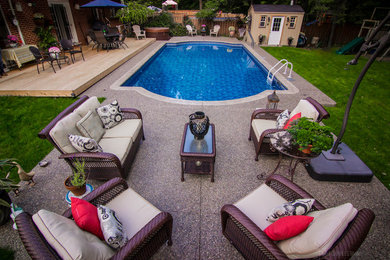 Example of a mid-sized trendy backyard gravel and custom-shaped natural pool house design in Atlanta