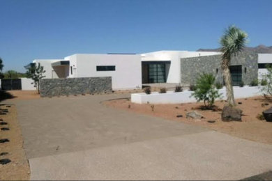 Southwestern exterior home idea in Phoenix