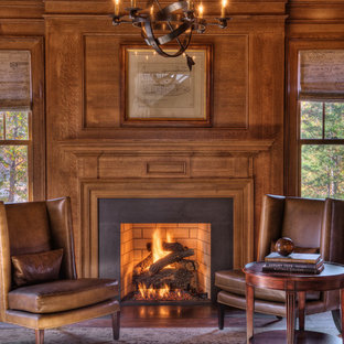 Inspiration for a traditional home office in Other with a concrete fireplace surround and a standard fireplace.
