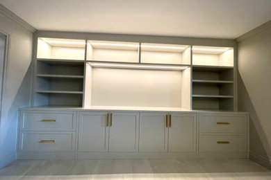 Example of a minimalist family room design in Montreal