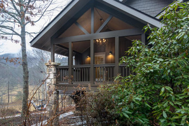 Inspiration for a rustic exterior home remodel in Charlotte