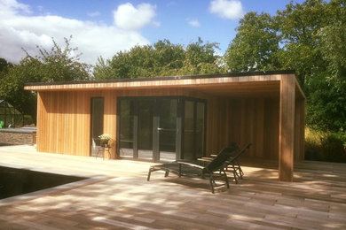 Wiltshire garden room with overhung seating area